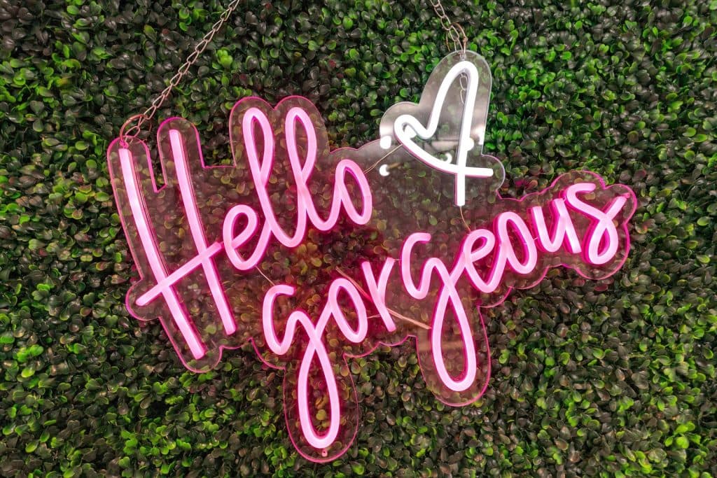 Hello Gorgeous neon sign at Victory Med Spa in Austin, Texas