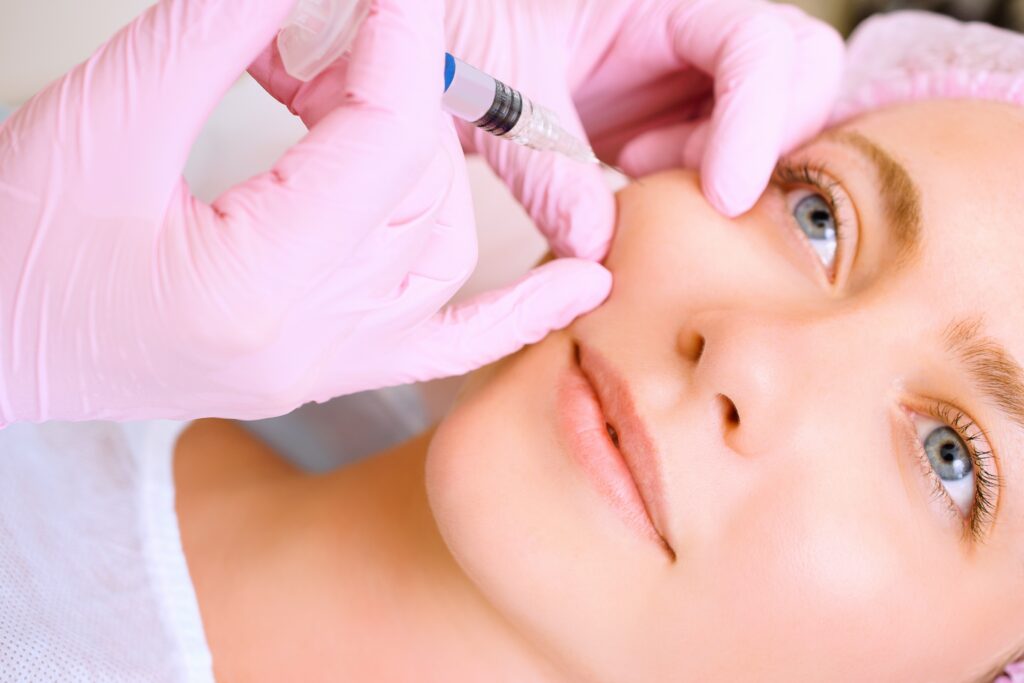 Aesthetic injector administering a neurotoxin treatment at a medical spa